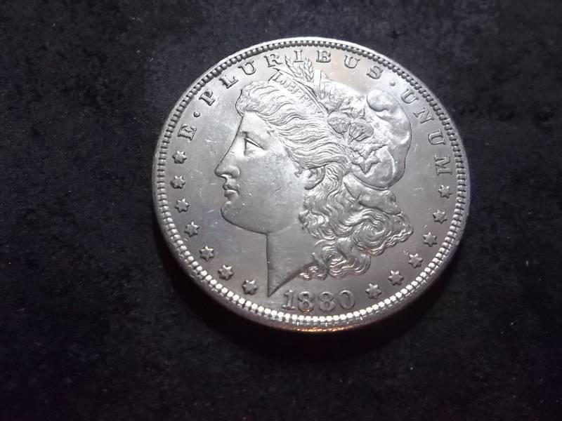 lot 10 image: 1880 S Morgan Silver Dollar