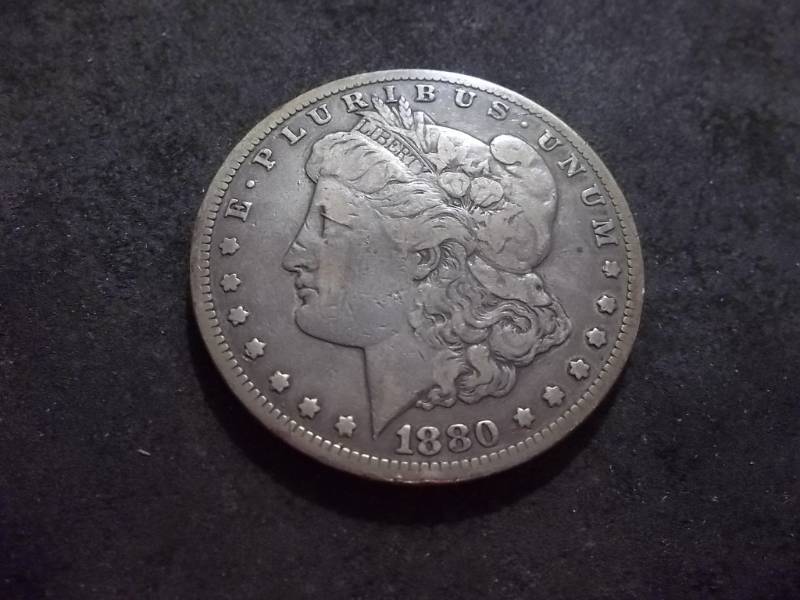lot 11 image: 1880 CC Morgan Silver Dollar