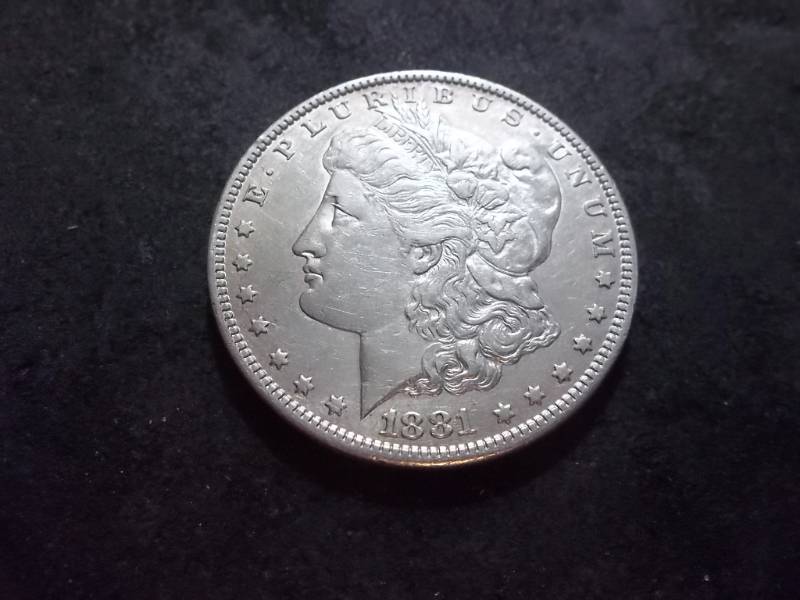 lot 13 image: 1881 O Morgan Silver Dollar