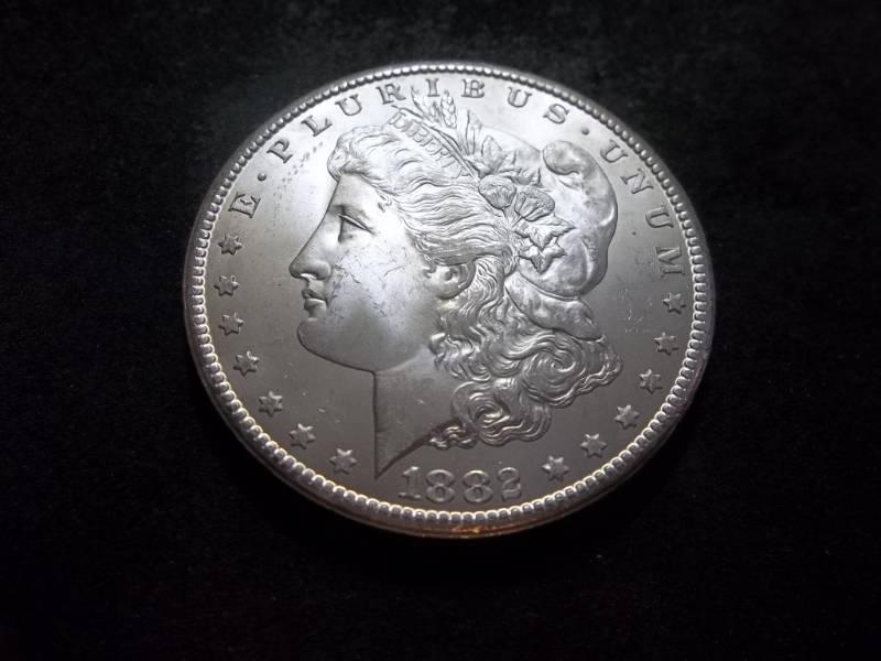 lot 19 image: 1882 CC  Morgan Silver Dollar