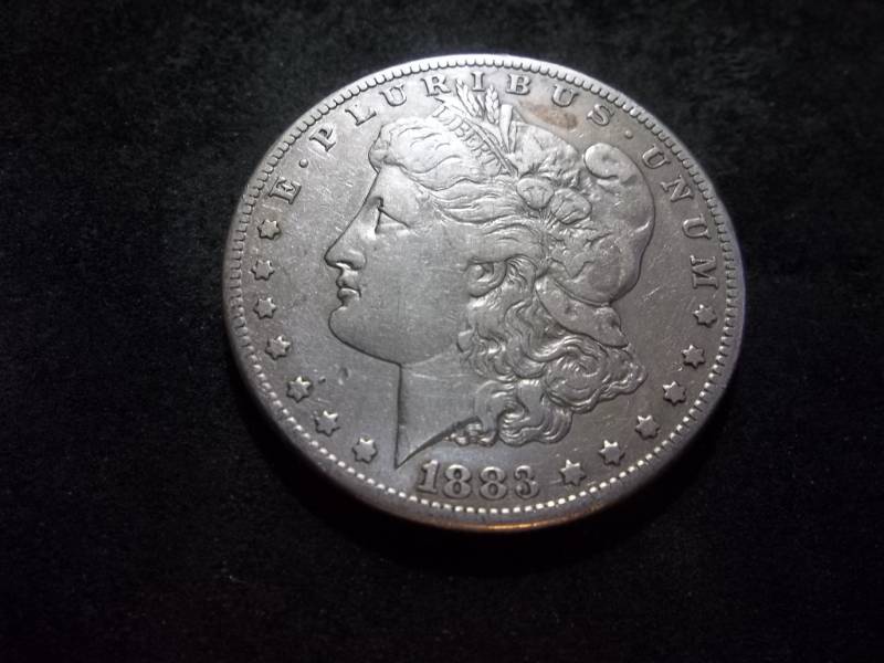 lot 22 image: 1883 S Morgan Silver Dollar