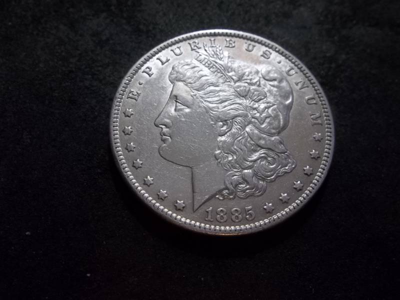 lot 28 image: 1885 Morgan Silver Dollar