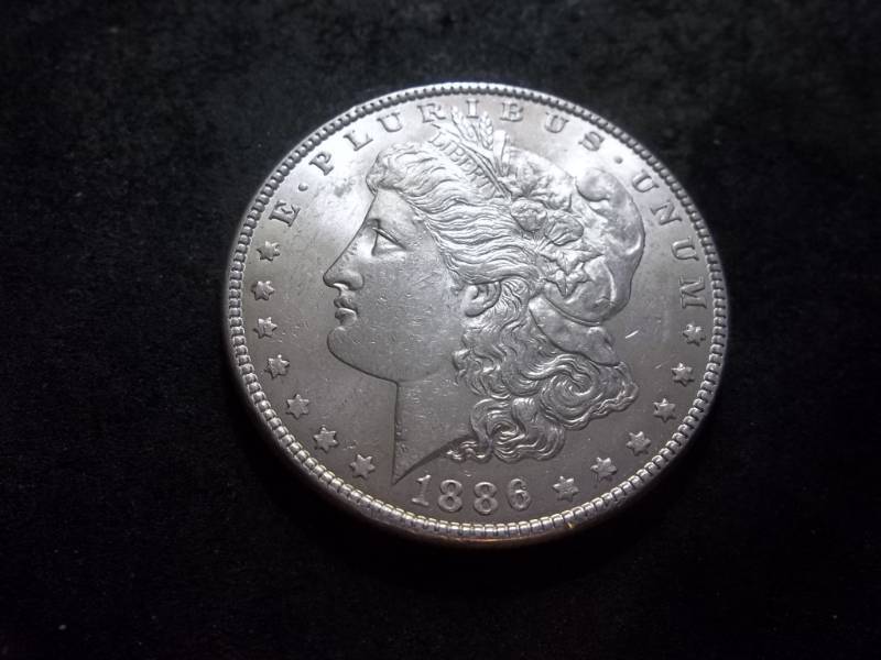 lot 32 image: 1886 Morgan Silver Dollar