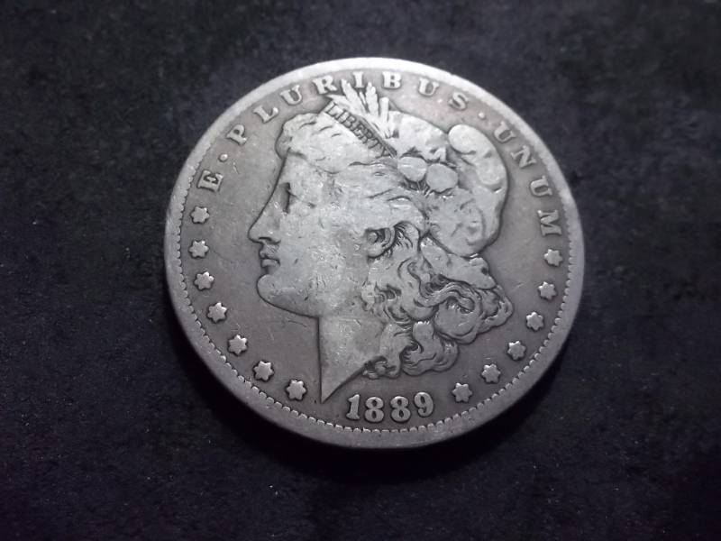 lot 44 image: 1889 CC Morgan Silver Dollar