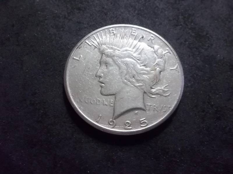 lot 51 image: 1925 Peace Silver Dollar