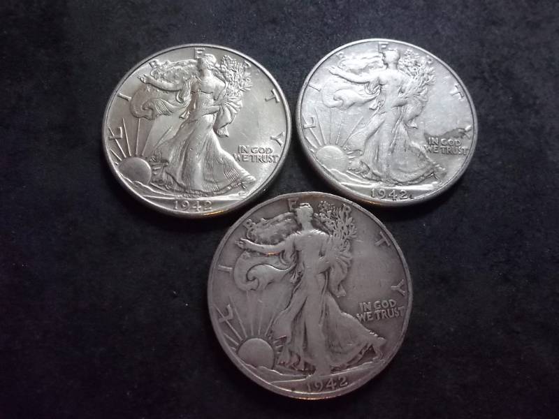 lot 98 image: 1942 P,D,S Walker Half Dollars