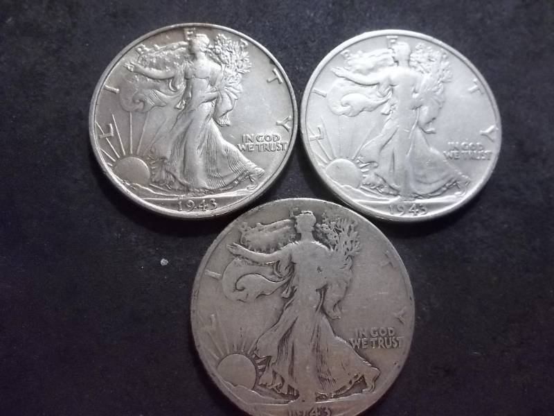 lot 99 image: 1943 P,D,S Walker Half Dollars
