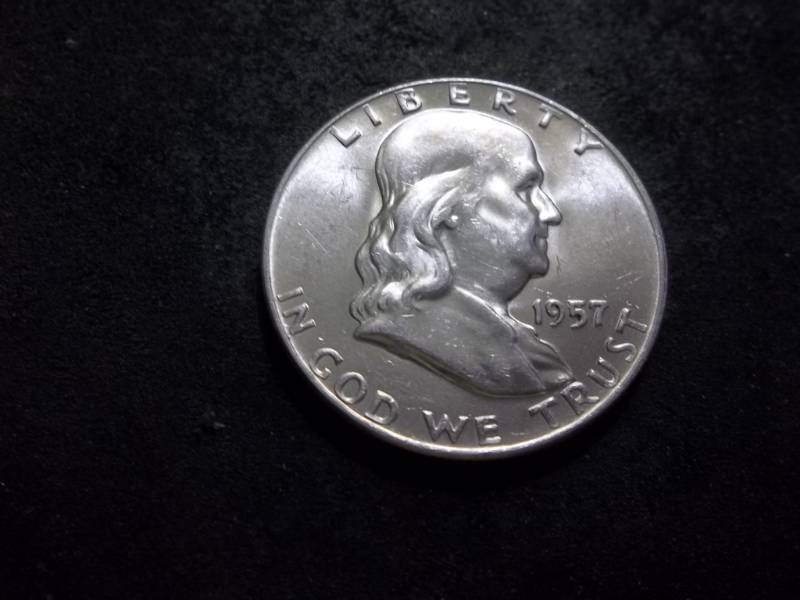 lot 128 image: 1957 D Franklin Half Dollar