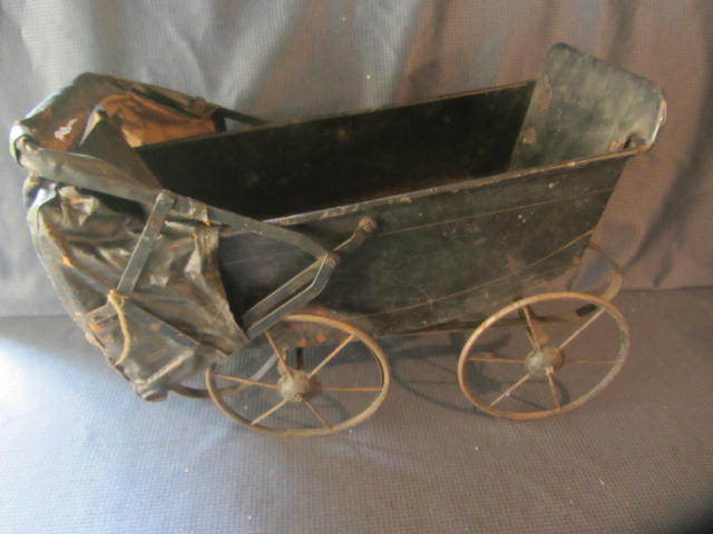 lot 26 image: Tin Doll Buggy