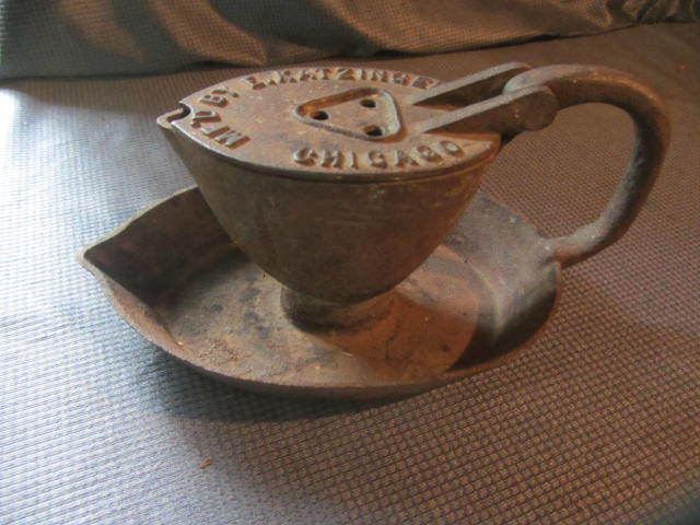 lot 11 image: Cast Iron Oil Lamp