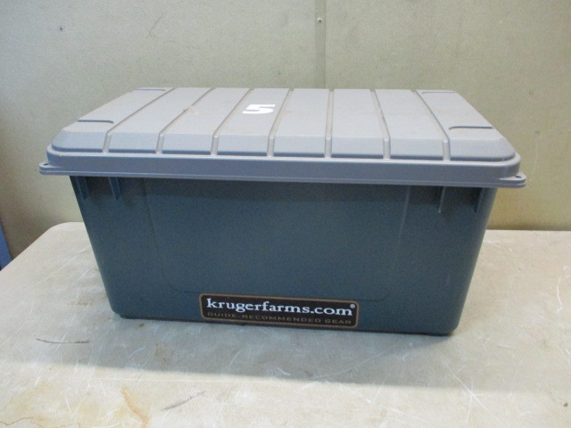 lot 96 image: Storage Case with Camo Clothes