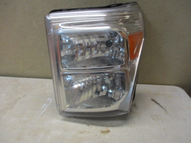 lot 100 image: 2015 Superduty Headlight