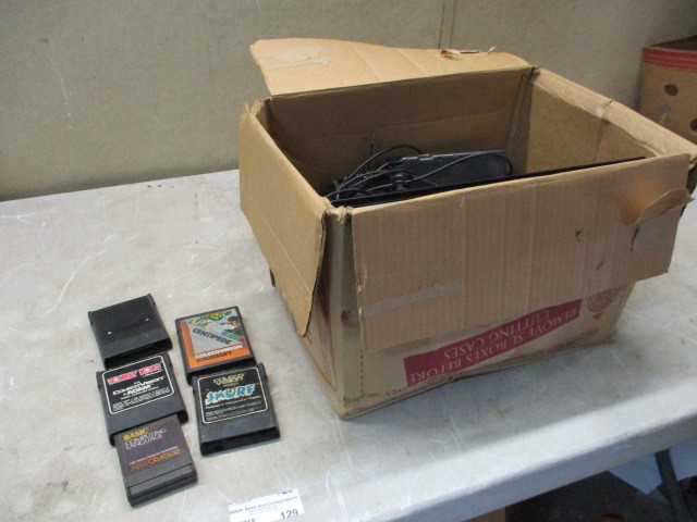 lot 129 image: Caleco Vision Game Console and games