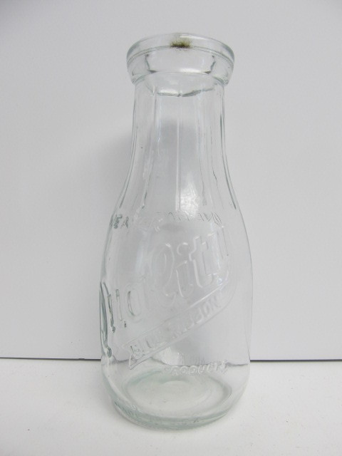 lot 35 image: Vintage Embossed Weaver Quality Blue Ribbon Dairy Milk Bottle