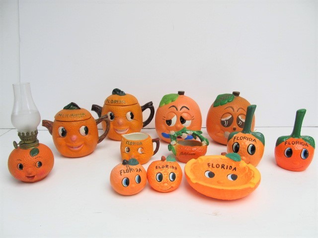 lot 88 image: Large Lot of Vintage 1950s etc Anthropomorphic ORANGE Ceramic Kitchen Collectibles