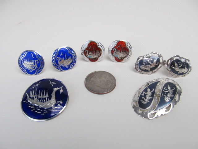lot 141 image: Group of Sterling Silver SIAM Earrings & Brooches