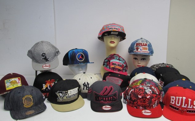 lot 61 image: Large Lot of Sports Hats - NBA etc