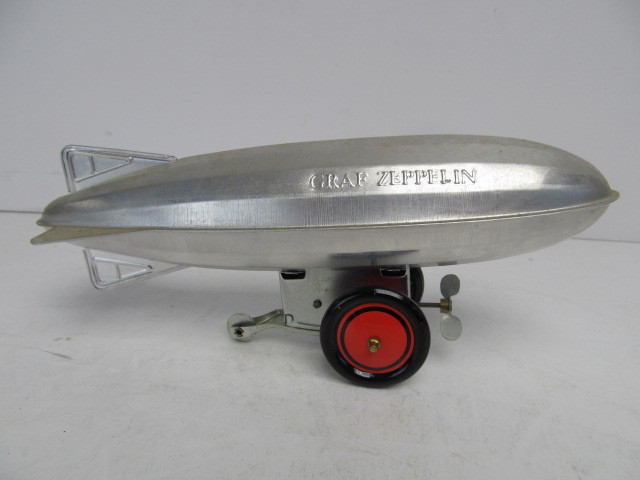 lot 89 image: GRAF ZEPPELIN tin Windup Toy
