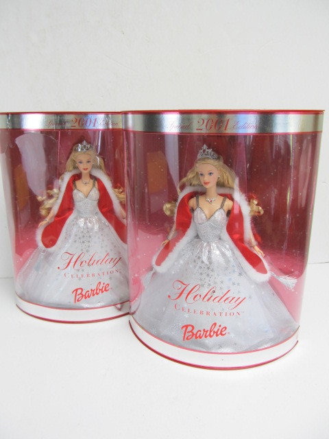 lot 152 image: Pair of Mint In Box Holiday Celebration BARBIE Dolls - Special 2001 Edition - Pair #1
