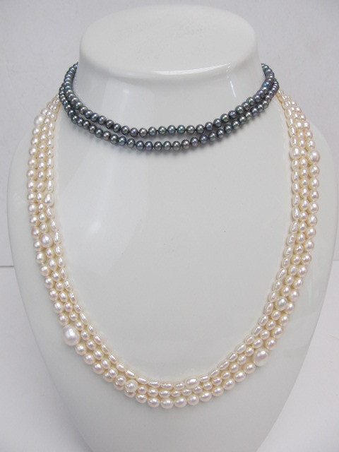 lot 178 image: Triple Strand Pearl Necklace 2 ft. each & Tahitian Pearl Necklace approx. 29 in.