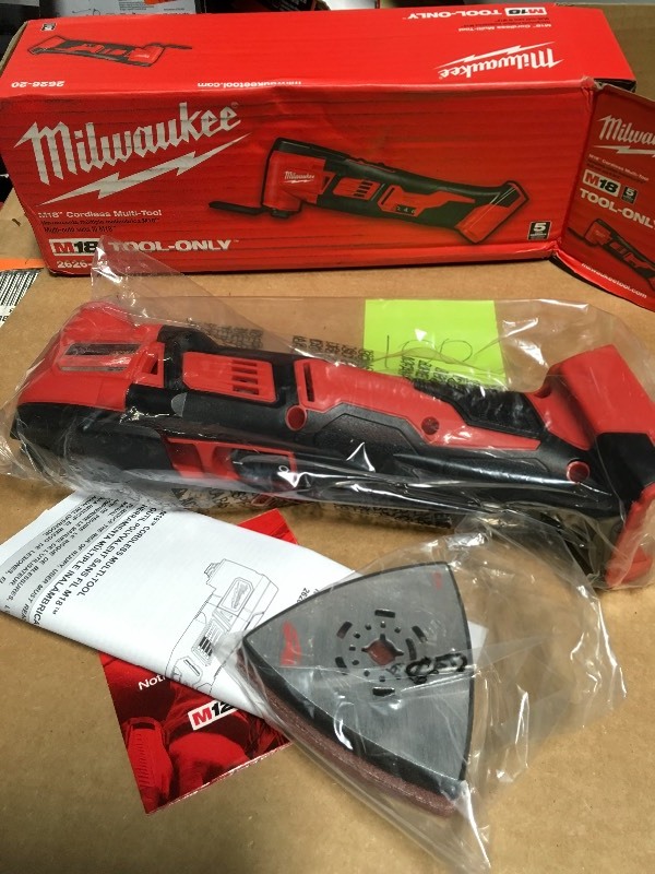 lot 100 image: Milwaukee M18 18-Volt Lithium-Ion Cordless Oscillating Multi-Tool (Tool-Only) new