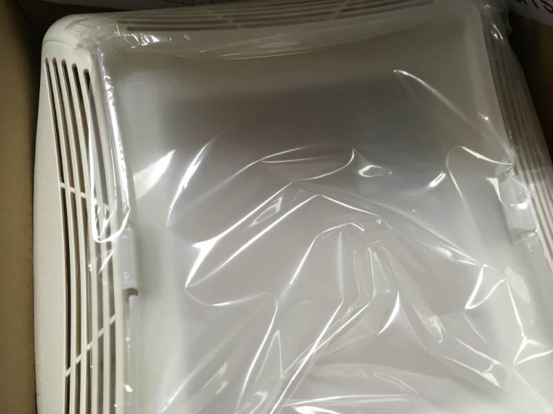 lot 6 image: NuTone 70 CFM Ceiling Bathroom Exhaust Fan with Light, White Grille and Light in good condition
