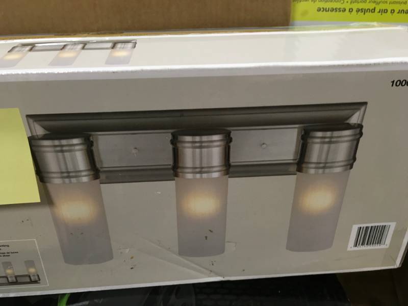 lot 34 image: 3-Light Brushed Nickel Wall Vanity Fixture not used