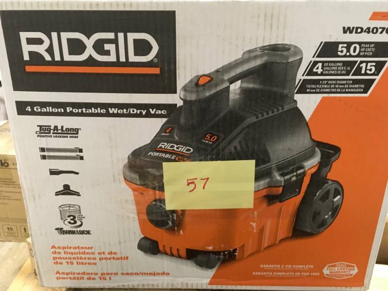 lot 57 image: RIDGID 4 Gal. 5.0-Peak HP Portable WetDry Vacuum in good condition