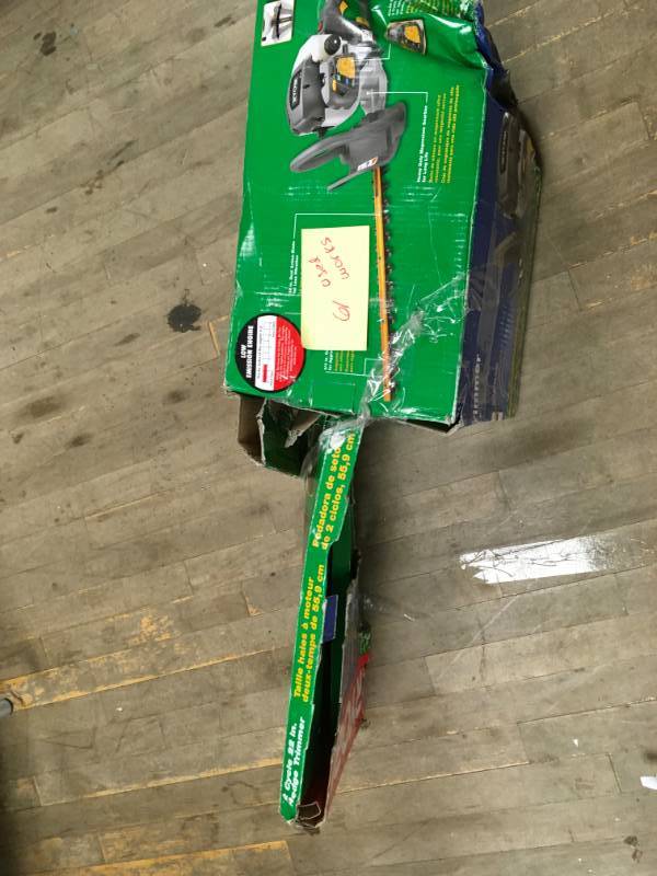 lot 61 image: RYOBI 22 in. 26 cc Gas Hedge Trimmer features a 26 cc 2-Cycle engine in working conditions