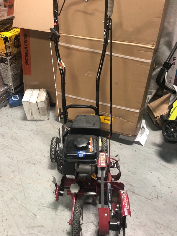 lot 114 image: Southland 9 in. 79cc Gas Walk-Behind Edger with Curb Hopping Feature used in good condition