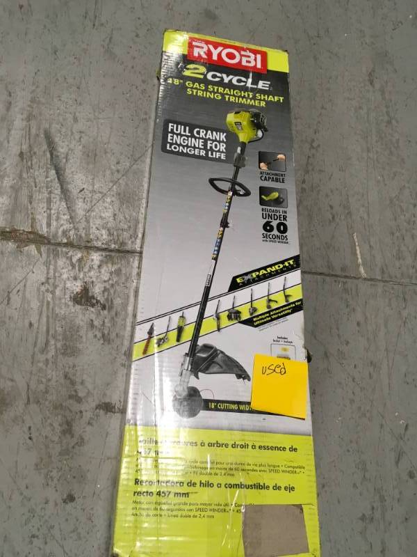 lot 14 image: RYOBI 2-Cycle 25cc Gas Full Crank Straight Shaft String Trimmer with Edger Attachment  in good condition
