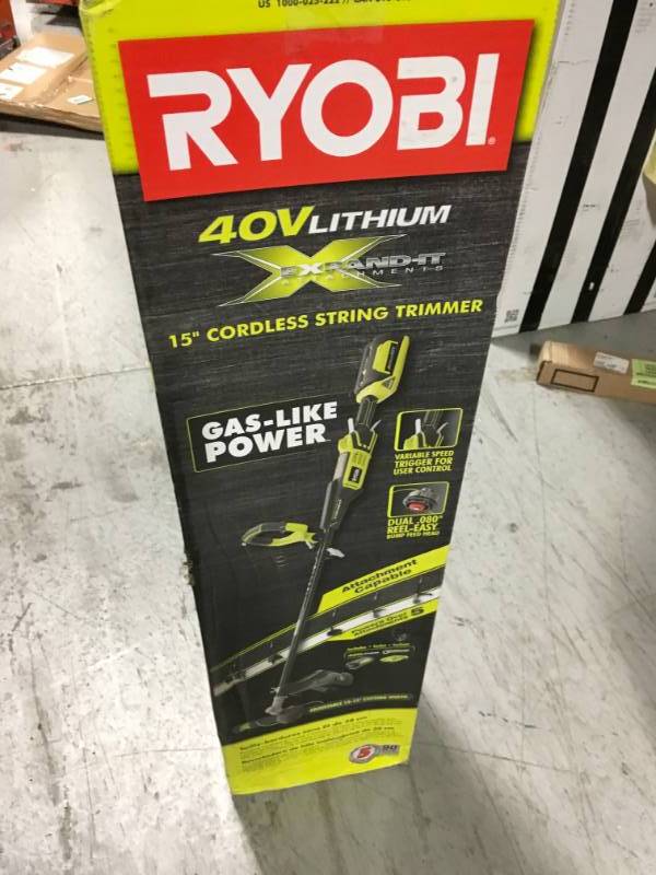 lot 36 image: RYOBI 40-Volt Lithium-Ion Cordless Attachment Capable String Trimmer, 4.0 Ah Battery and Charger Included USED  in good condition