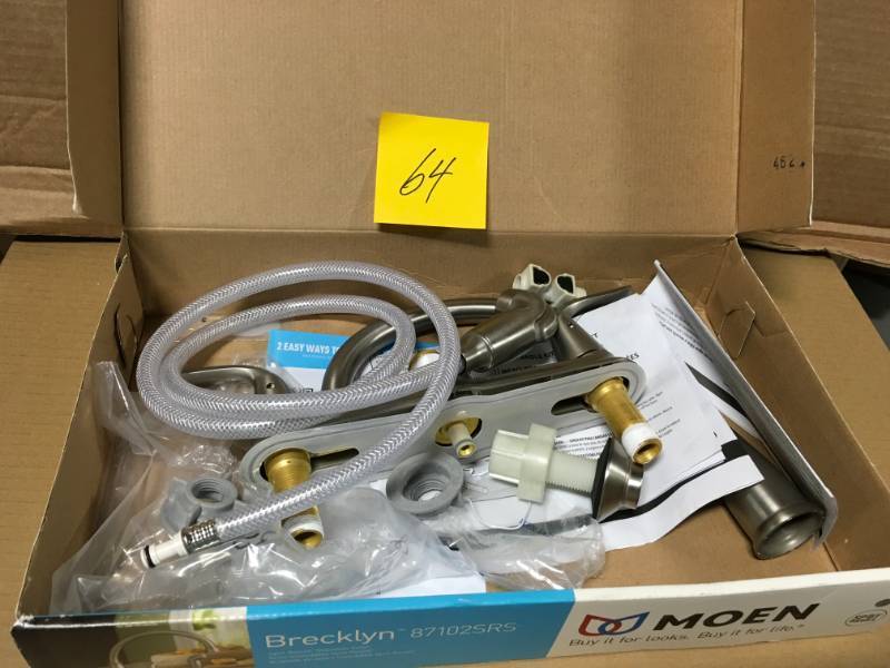 lot 64 image: MOEN Noell Single-Handle Standard Kitchen Faucet with Side Sprayer in Spot Resist Stainless  in good condition