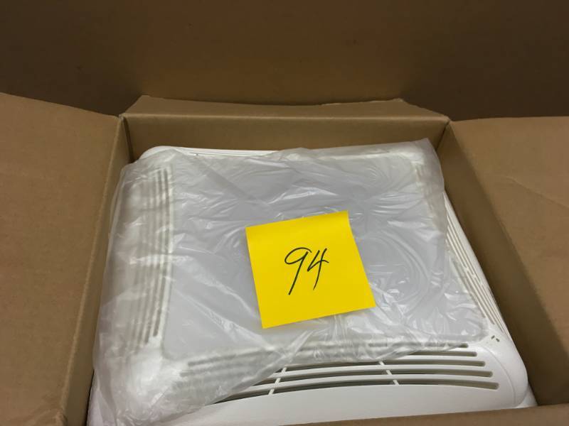 lot 94 image: NuTone 70 CFM Ceiling Bathroom Exhaust Fan with Light, White Grille and Light  in good condition