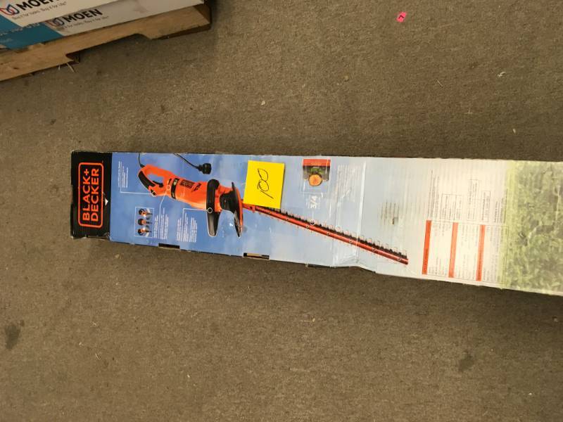 lot 100 image: BLACKDECKER 24 in. 3.3-Amp Corded Electric Hedge Hog Trimmer with Rotating Handle  in good condition