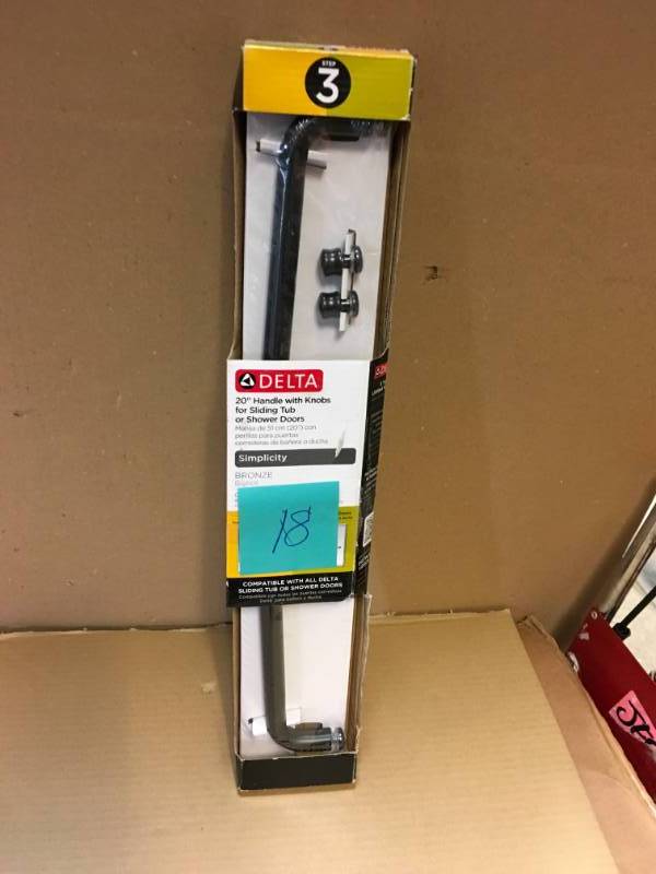 lot 18 image: Delta Simplicity Handle with Knobs for Sliding Shower or Bathtub Door in Bronze