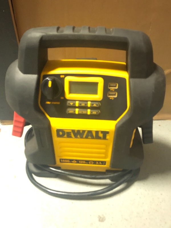 lot 110 image: DEWALT 1400 Peak Amp Jump Starter with Digital Compressor in good condition