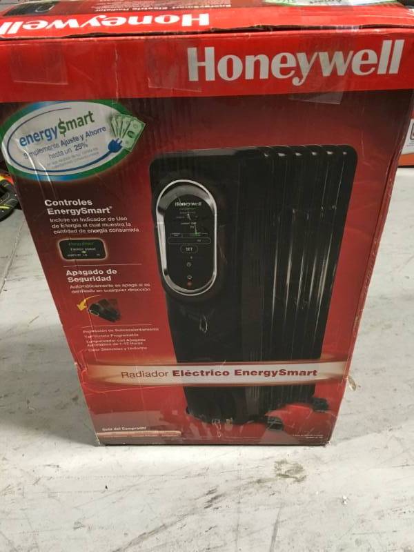 lot 27 image: Honeywell 1500-Watt Oil-Filled Radiant Portable Heater with EnergySmart Electric Radiator in good condition