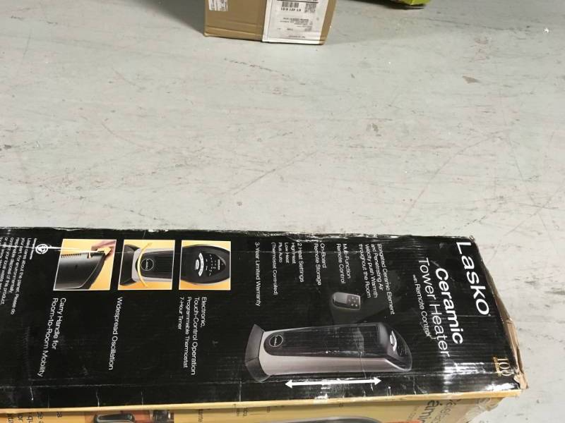 lot 60 image: Lasko 23 in. 1500-Watt Electric Portable Ceramic Tower Heater USED in good condition