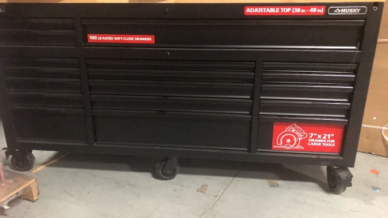 lot 111 image: Husky 72 in. 18-Drawer Mobile Workbench with Adjustable-Height Solid Wood Top in Matte Black in good condition