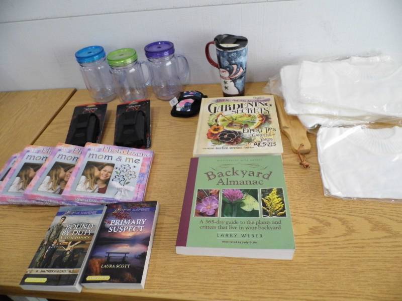 lot 92 image: Drink Mugs - Phone Cases - Books