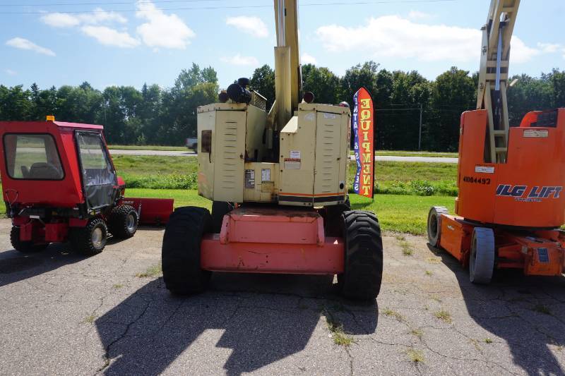 lot 4 image: 1999 JLG Model 60HT 60 All Terrain Boom Lift