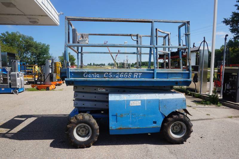 lot 11 image: Genie Model GS2668 RT 4 x 4 All Terrain Scissors Lift
