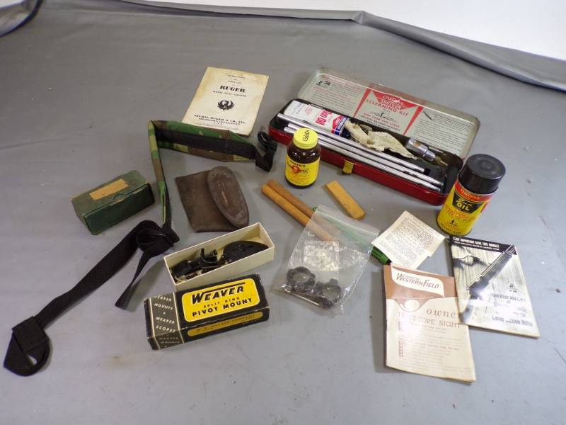 lot 8 image: Gun Parts and Cleaning kit with supplies