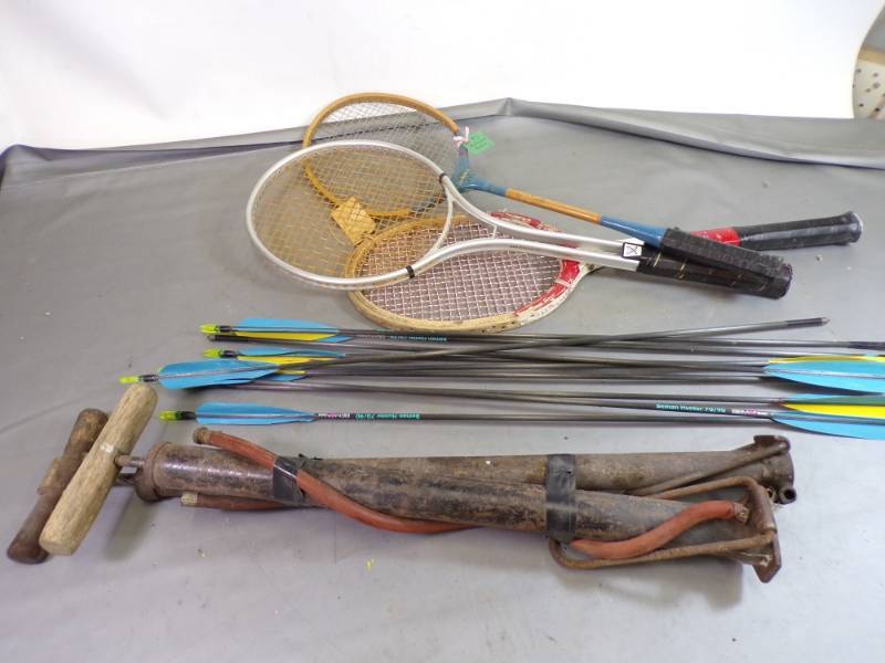 lot 70 image: Vintage Air Pumps, Arrows, and Tennis Rackets