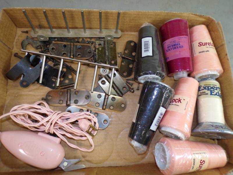 lot 90 image: 7 Serger Thread Spools, Dritz Scissors, Sewing Machine Hardware
