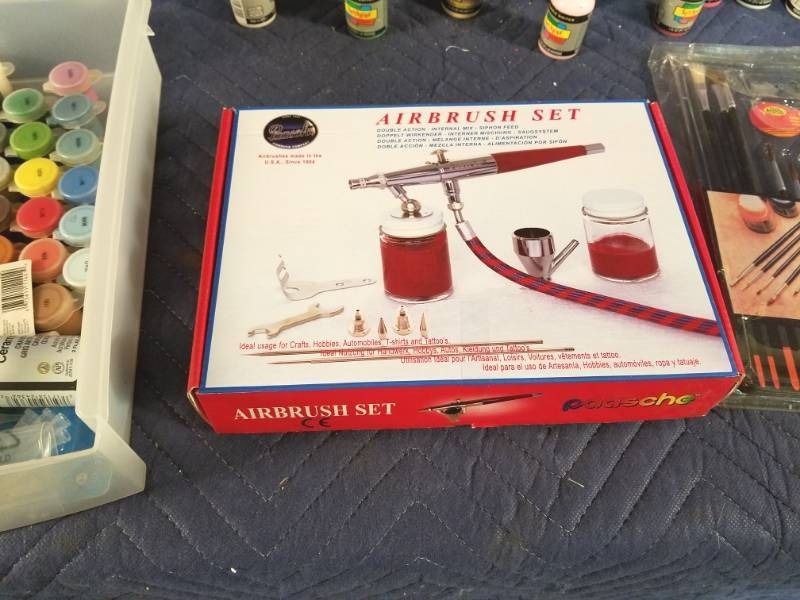 lot 12 image: Airbrush Set and Model Train Decals, Paints, and More 