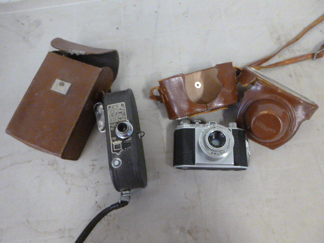 lot 77 image: Vintage Keystone 8mm Camera and Welmy 35 Camera