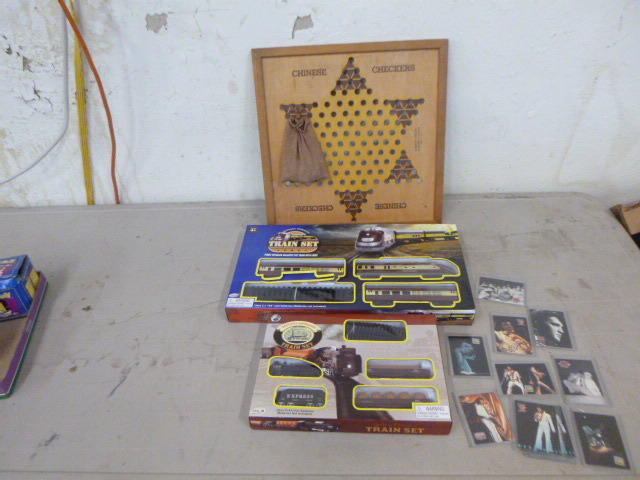 lot 80 image: Train Sets, Chinese Checkers and Elvis Cards