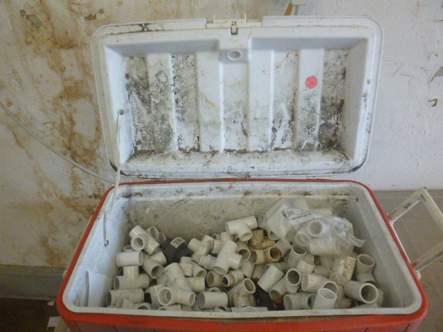 lot 150 image: Cooler Full of PVC Pipe Fittings